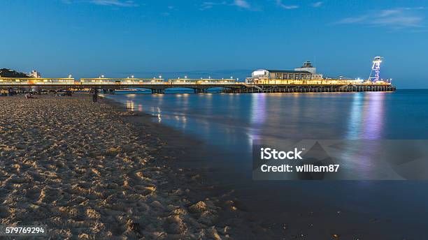 Pier In Bournemouth At Night Long Exposure Shot Stock Photo - Download Image Now - Bournemouth - England, Architecture, Beach