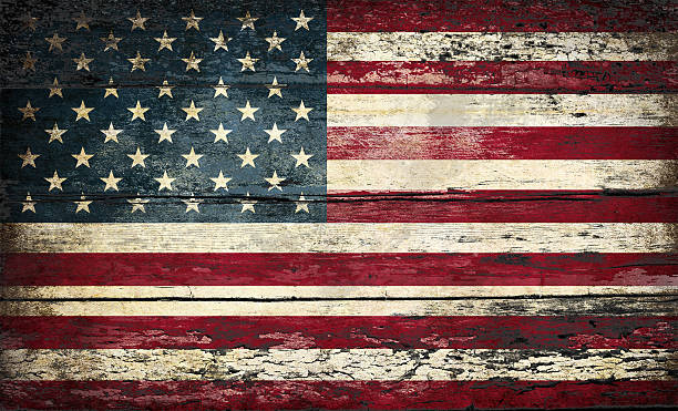 istock Flag of USA, painted on a grunge plank 579769710