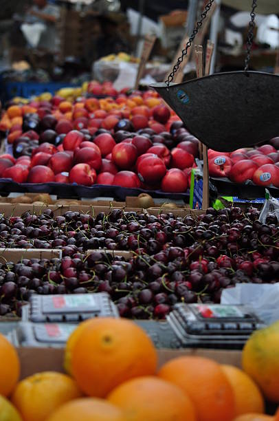 Fresh Cherries with Hanging Scale at Farmer's Market