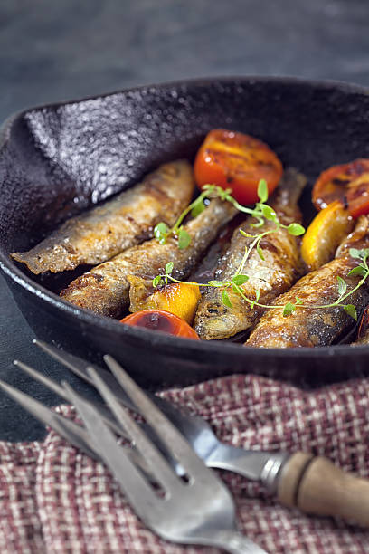 istock Grilled fish in cast iron skillet 579777032
