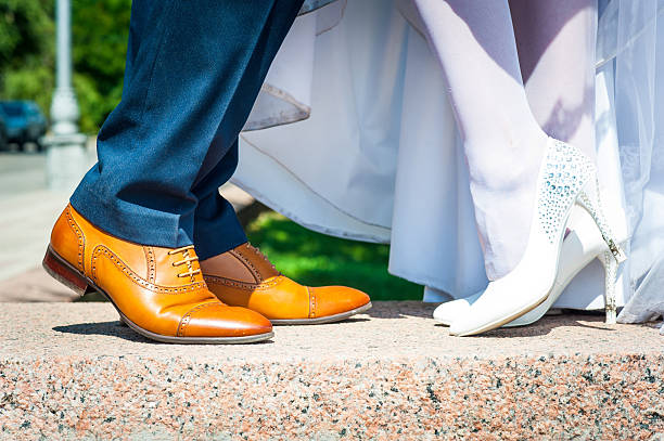 istock Bride and groom legs 579777180