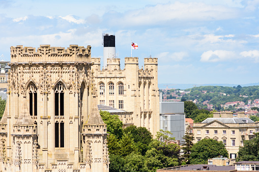 Bristol, England - July 17, 2016: The University of Bristol's distinctive Victorian gothic Wills Memorial Building and School of Physics standing prominent over the cityscape.