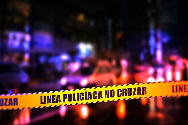 istock Police Line Do Not Cross Tape - Spanish 579777710