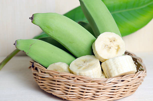 istock Banana fruit sliced on plate with leaf 579778742