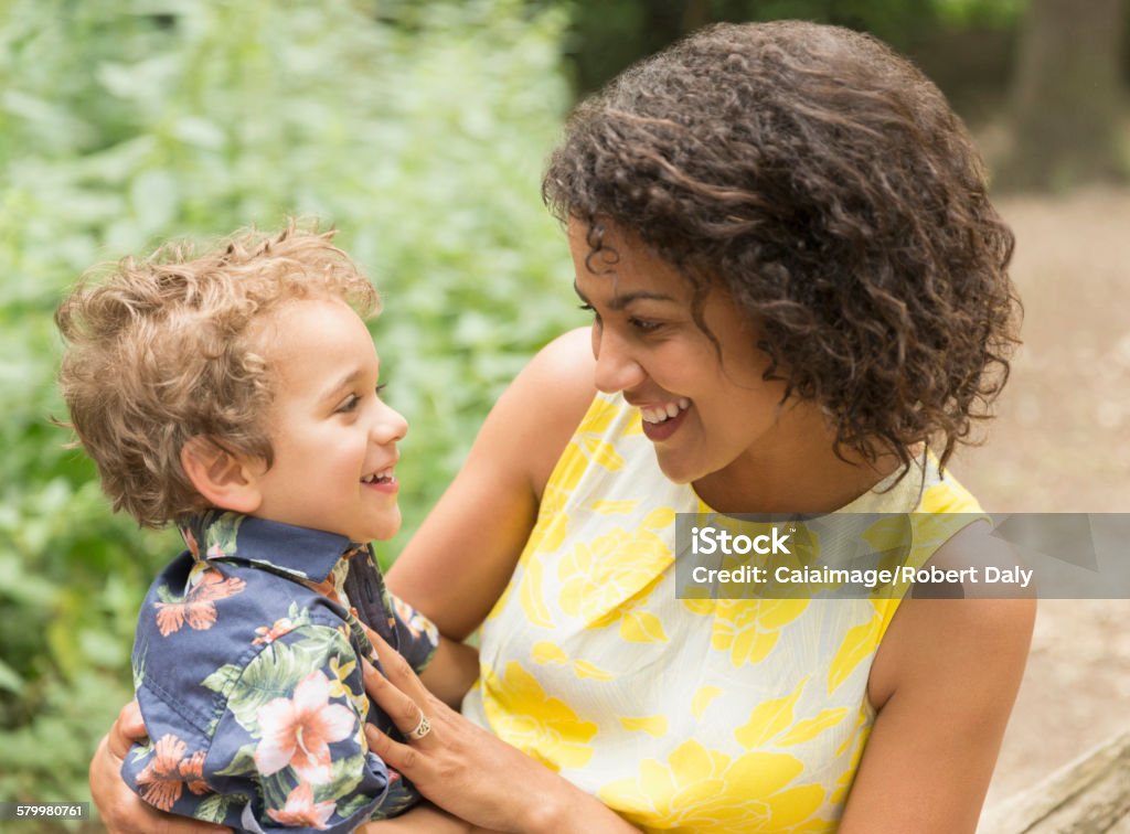 Smiling mother and son face to face  One Parent Stock Photo