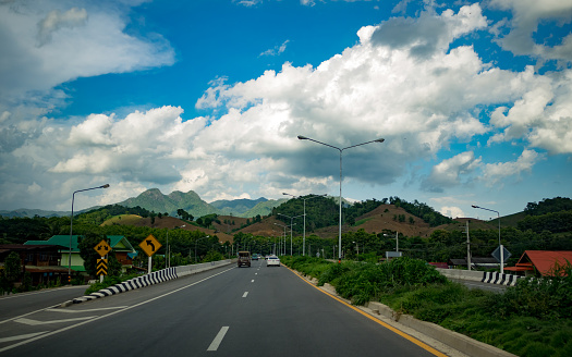 road,mountain,hill,highway,forest,countryside,Thai