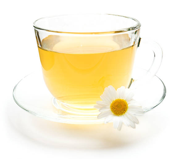 istock Cup of green tea with chamomile flower 580091168