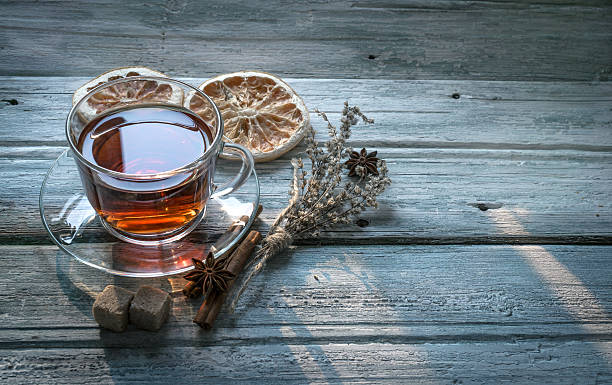 istock Cup of tea and dry twig herb 580091316