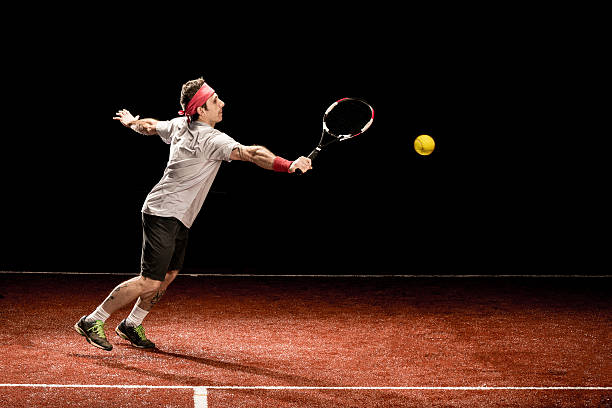 tennis-spieler-aktion: rückhand volée - indoor tennis flash stock-fotos und bilder