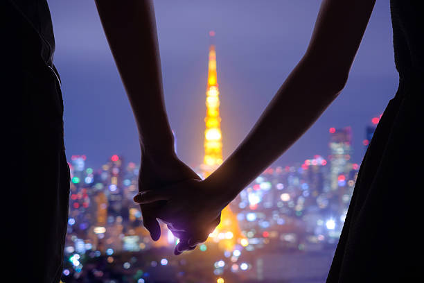 istock romantic lovers with tokyo tower 580093460