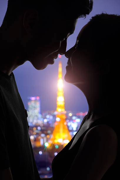 istock romantic lovers with tokyo tower 580093756