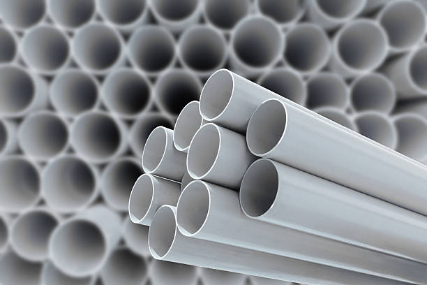 PVC pipes stacked in warehouse. stock photo