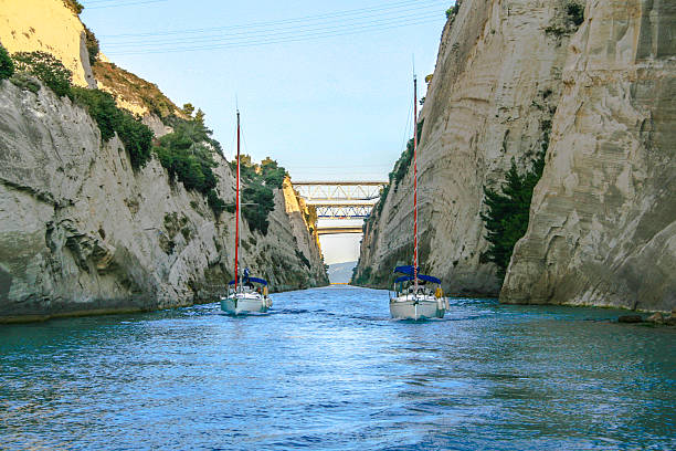 two yachts and three bridges in the corinth canal, greece. - gulf of corinth imagens e fotografias de stock