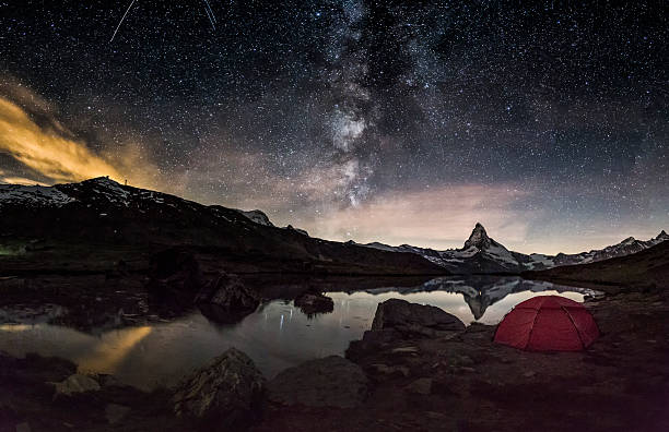 istock Loneley Tent under Milky Way at Matterhorn 580095320