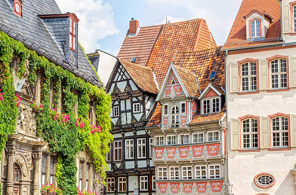 Half-timbered houses in Quedlinburg, Germany Timber framing houses Quedlinburg old town, Germany half past stock pictures, royalty-free photos & images