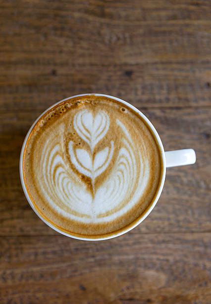istock Coffee late art on wood background 580097458