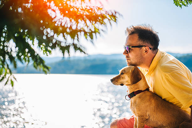 istock Man and his dog enjoying time together 580099242