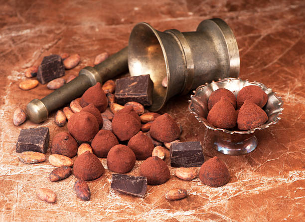 istock Chocolate truffles, chocolate and cacao beans 580101056