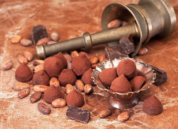 istock Chocolate truffles, chocolate and cacao beans 580101188