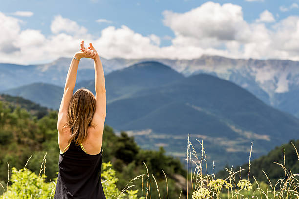 istock Women stretching in the nature 580101212