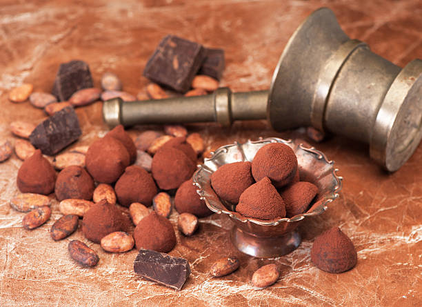 istock Chocolate truffles, chocolate and cocoa beans 580101262
