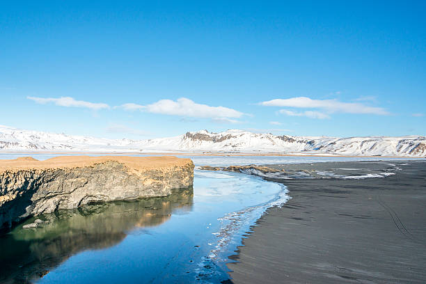 istock Reynisfjara basalt black sand beach from Dyrholaey. Vik, South Iceland. 580102118