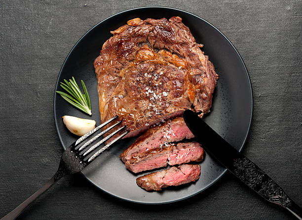 istock Medium rare grilled Steak Ribeye. Top view 580102236