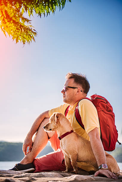 istock Man and dog enjoying time together 580102328