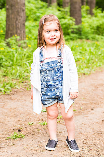 istock Cute and young little girl smiling 580103766