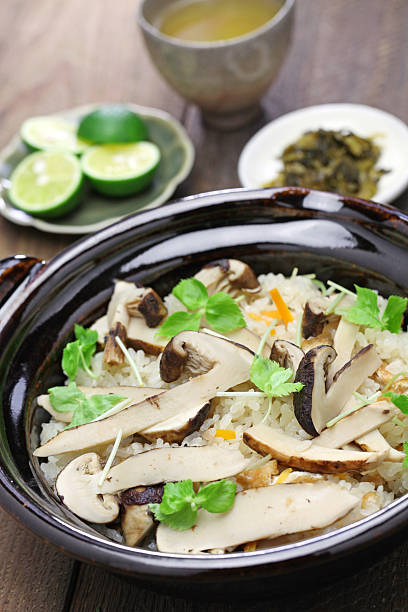 istock matsutake gohan, rice cooked with matsutake mushroom 580103886