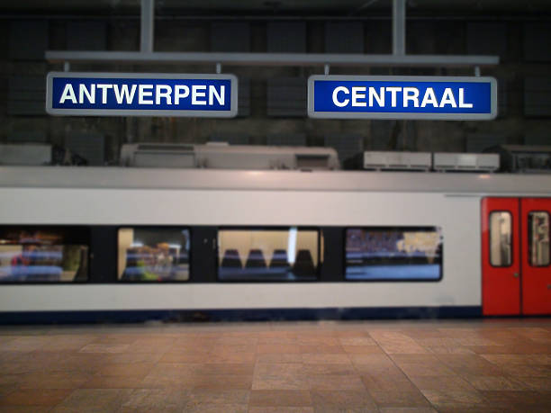 istock Antwerp Central Station Sign And Parked Train 580104092
