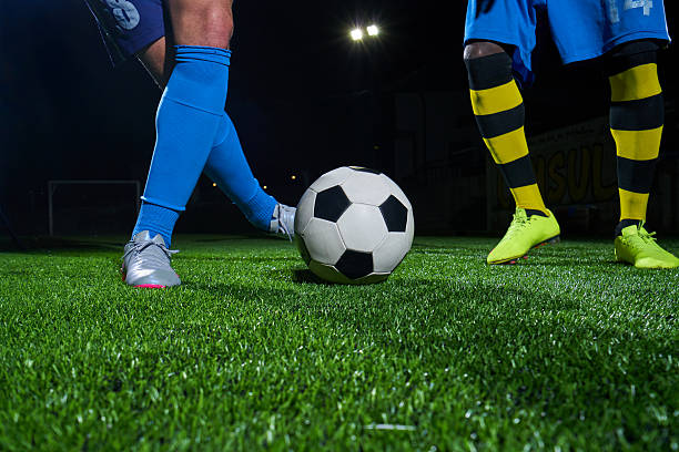 istock Soccer player with ball 580105440
