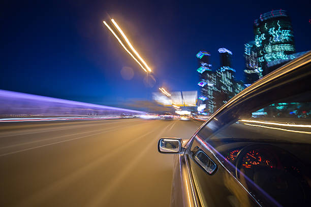 istock The car moves at the night. 580105874