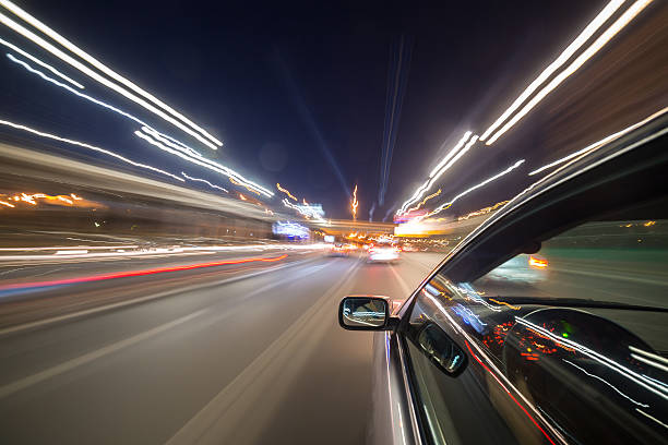istock The car moves at the night. 580105912