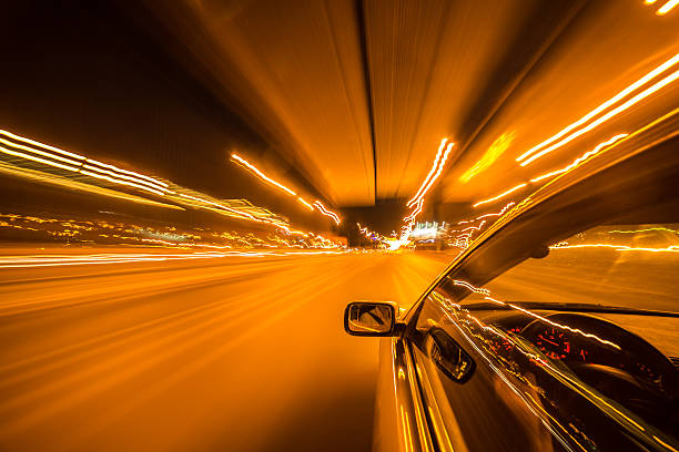 istock The car moves at the night. 580105962