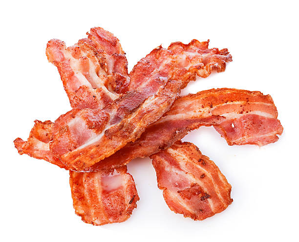 istock Cooked bacon rashers close-up isolated on a white background. 580106990