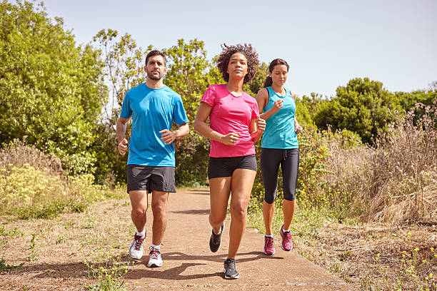 Three joggers on a leisurely run