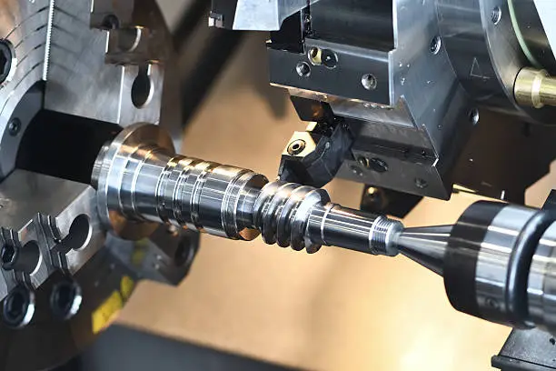 Photo of metalworking industry. cutting tool making worm shaft at metal working