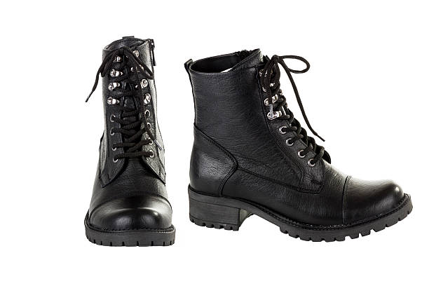 istock black leather winter  shoes isolated on white 580110254