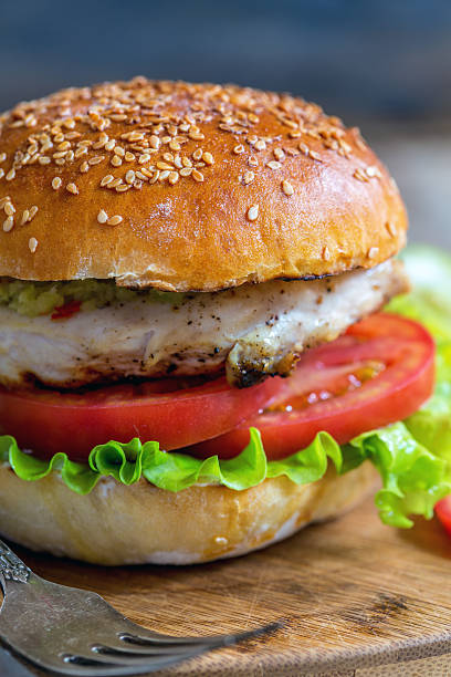 istock Burger with salad and chicken. 580110426
