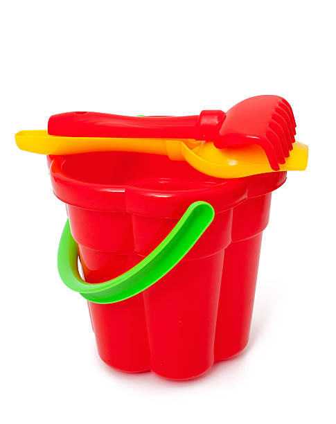 istock play set with bucket, shovel and rake on white 580112370