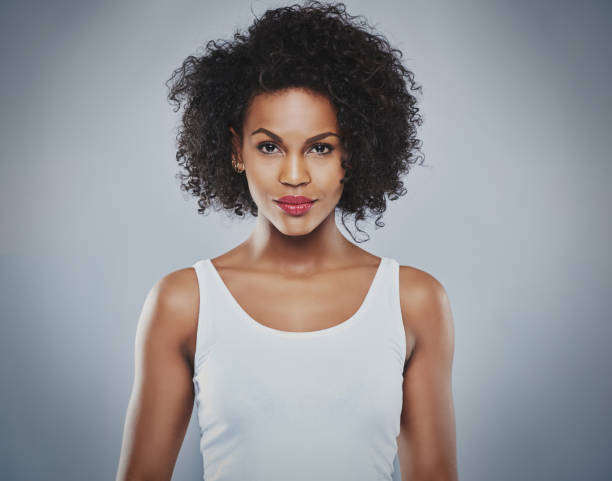istock Centered front view of pretty grinning woman 580113194