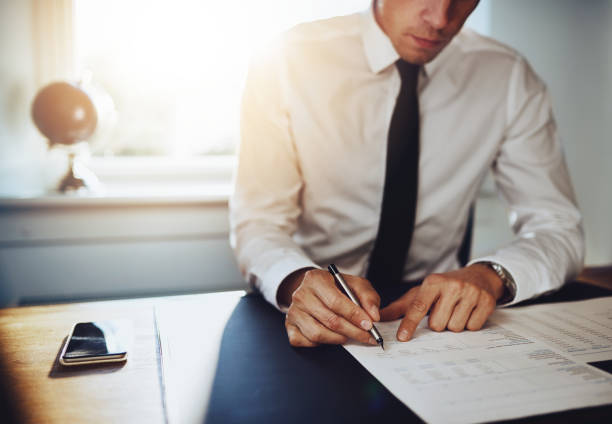 Business man or accountant lawyer working on documents Business man or accountant lawyer working on documents, close up business concept proof reading documents stock pictures, royalty-free photos & images