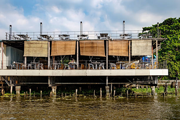 Bangkok, Thailand - December 8, 2015: Old Chao Phraya River Thai traditional cafe, village riverfront in Bangkok, Thailand.