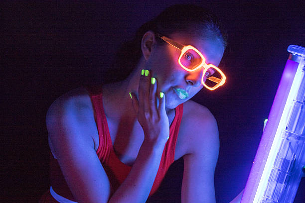 istock Female Adult Under An Ultra Violet Light 580119326
