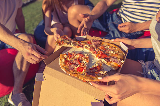 istock Young people resting outdoors 580121940