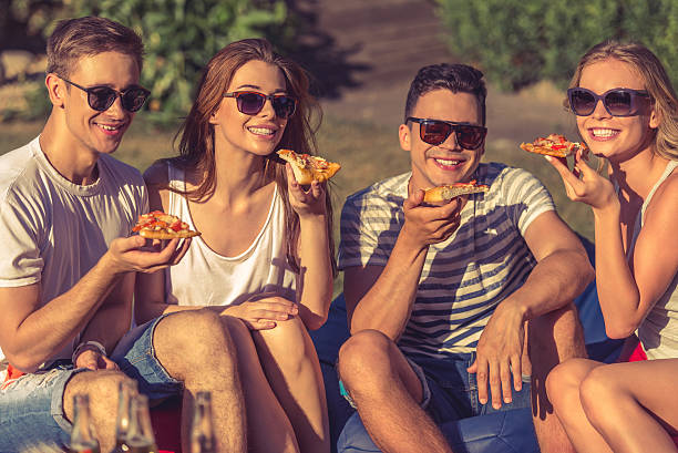 istock Young people resting outdoors 580122270