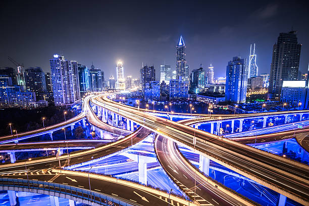 shanghai autostrada di notte - light trail shanghai city street city foto e immagini stock
