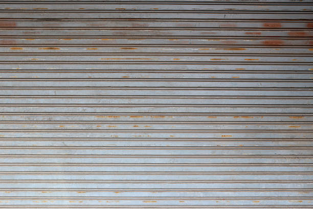 istock Old steel door weathered and rusty background. 580128246