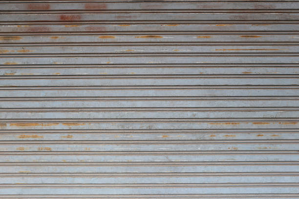 istock Old steel door weathered and rusty background. 580128288